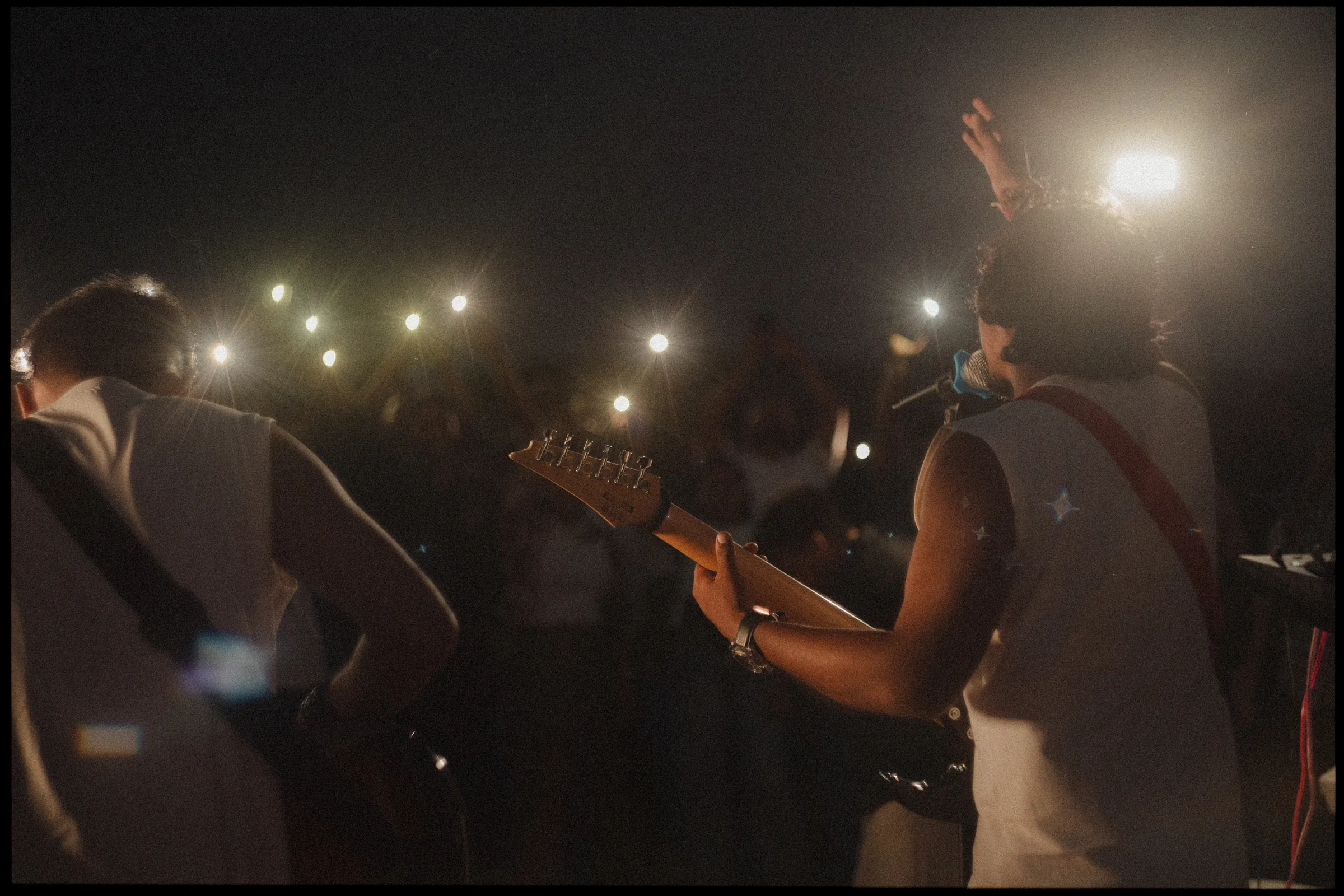 Guitar, torchlight and hills